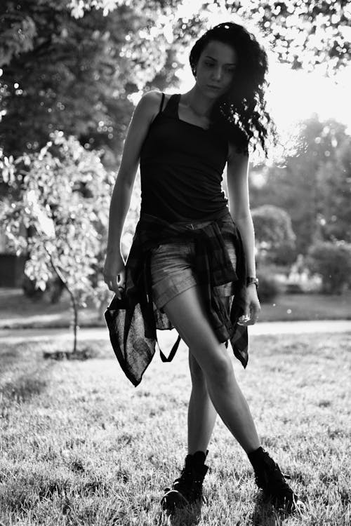 Monochrome Photo of Woman in Black Tank Top 