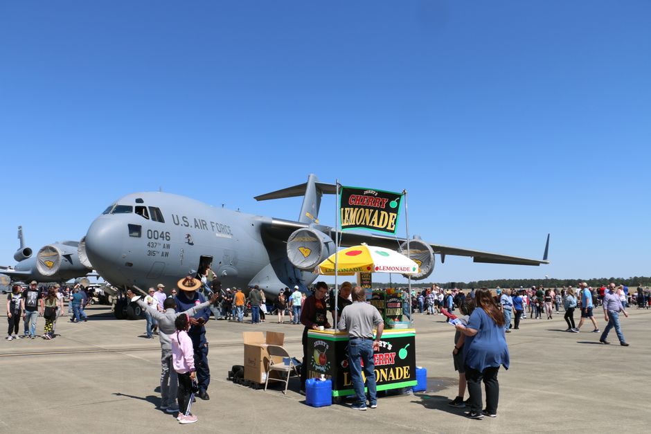 Sailors from VP-26 interacting with Japanese festival attendees and explaining aircraft features Sailors from VP-26 interacting with Japanese festival attendees and explaining aircraft features