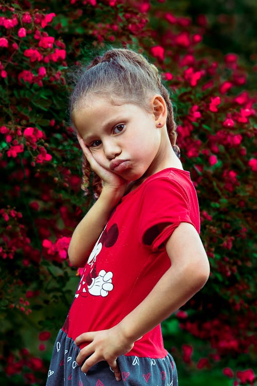Free Girl in Red and White Crew Neck T-shirt Stock Photo