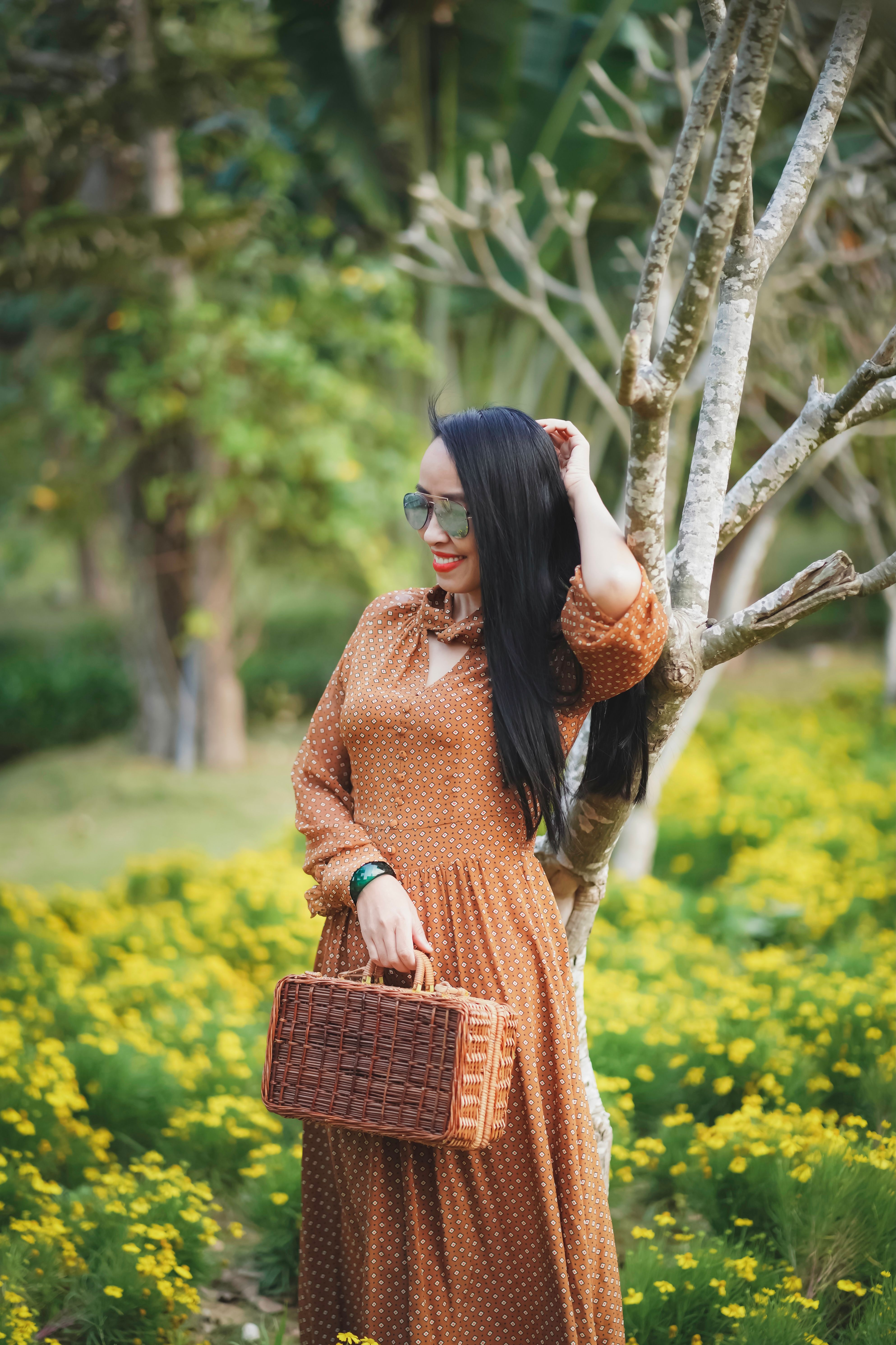A Woman in Brown Polka Dots Dress  Free Stock Photo