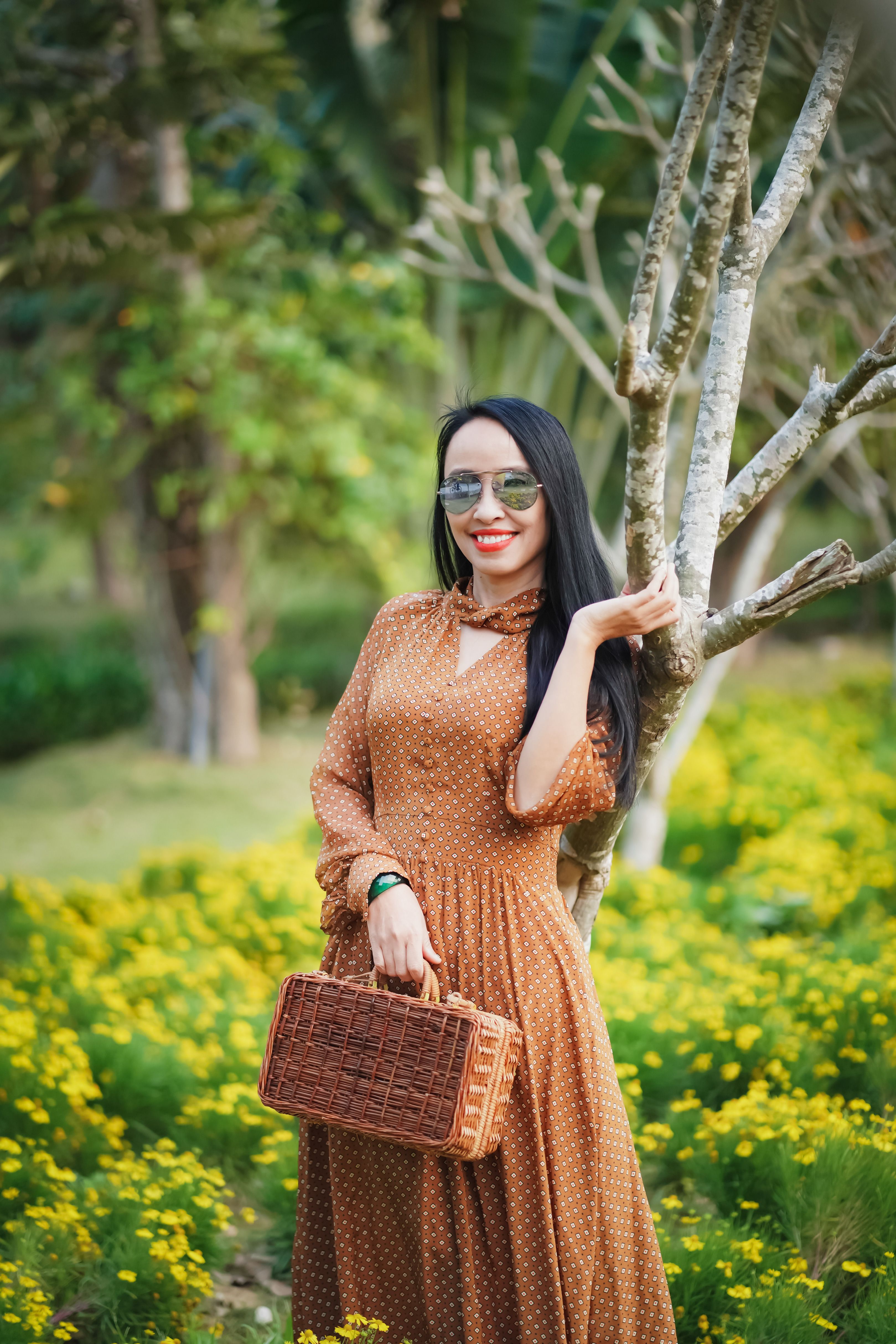 Beautiful Woman in Brown Dress · Free Stock Photo — free download