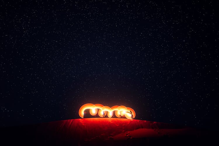 Fire Show On A Desert At Night 