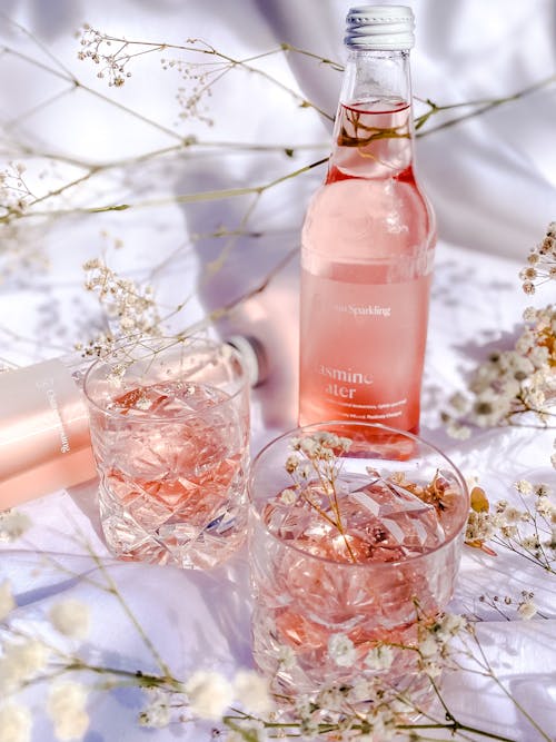 Free Clear Glass Bottle With Jasmine Water Stock Photo