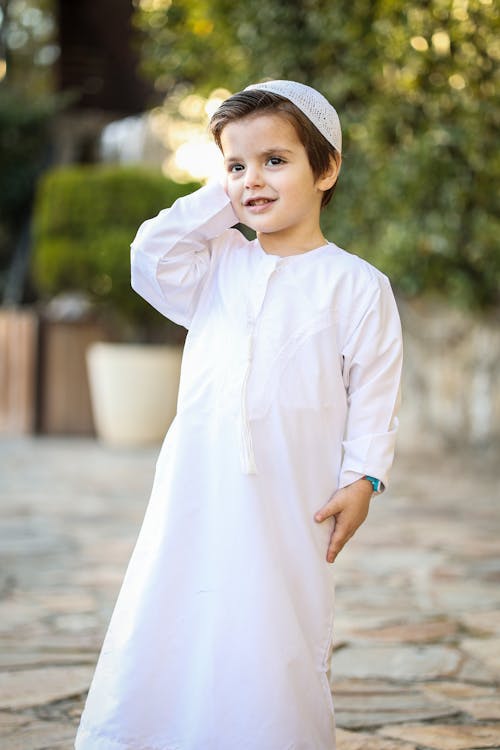 Boy Wearing a White Dress 