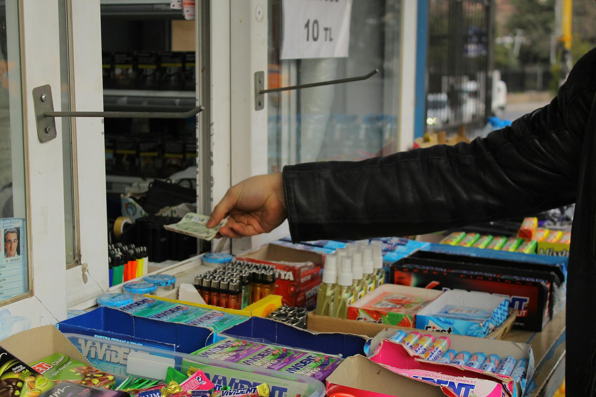 Consumer paying through a Window