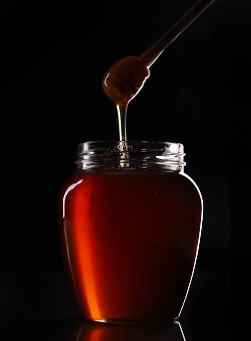 Clear Glass Jar With Honey