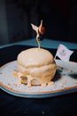 White Ice Cream on White Ceramic Plate