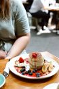 Plate with Souffle Pancakes and Fruits