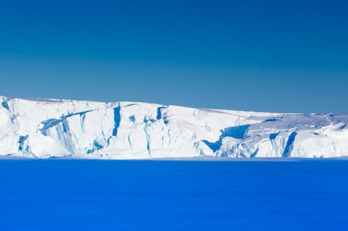 Snow Covered Mountain near Ocean