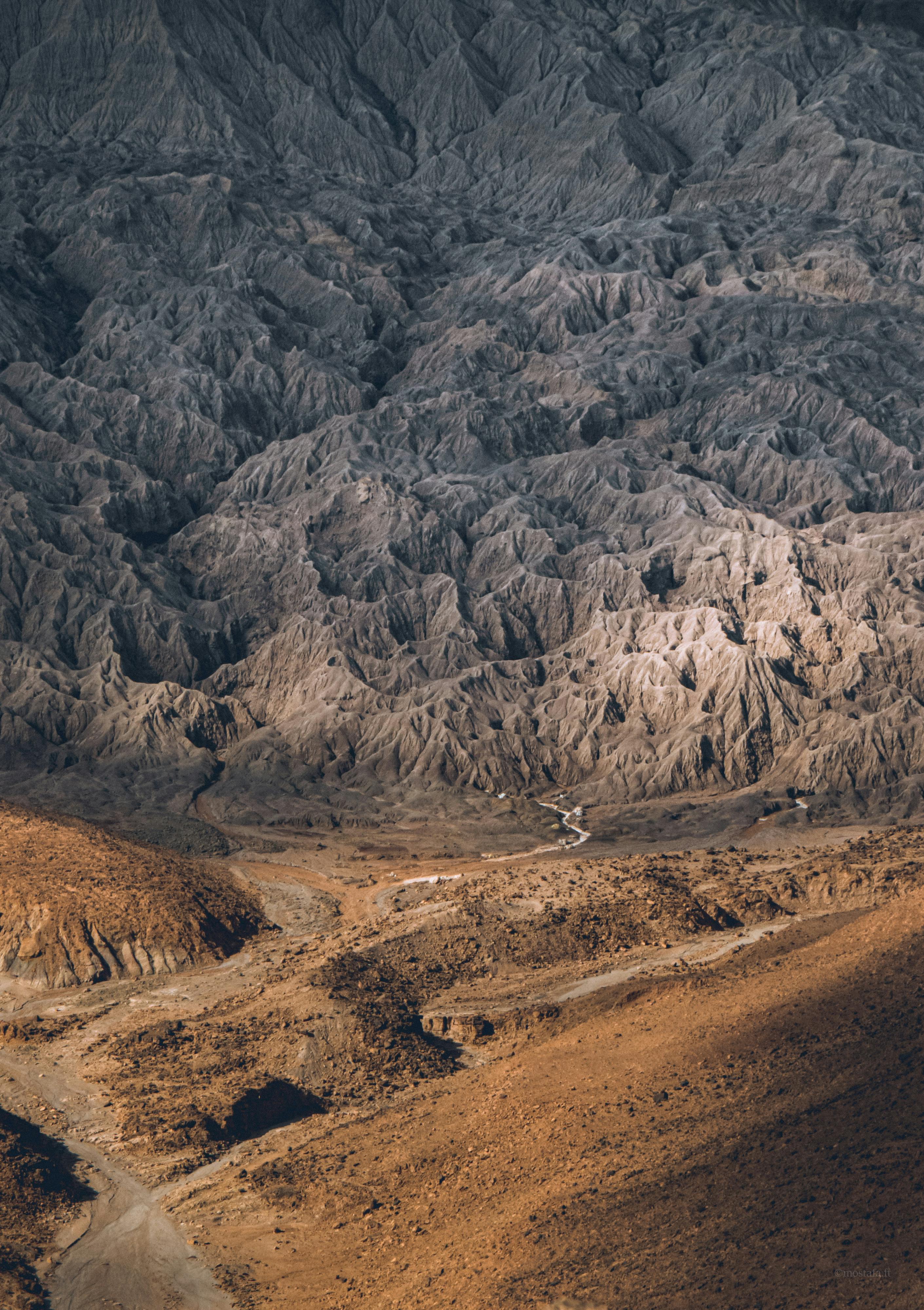 Stunning aerial view of rocky formations in El Bayadh, Algeria showcasing natural erosion.