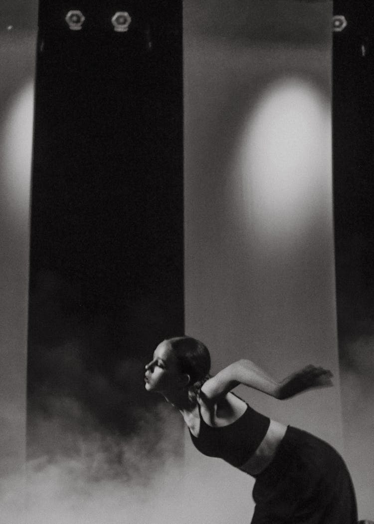 Black And White Photo Of Dancer On Stage