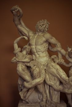Marble sculpture depicting the famous Laocoön Group from Greek mythology.