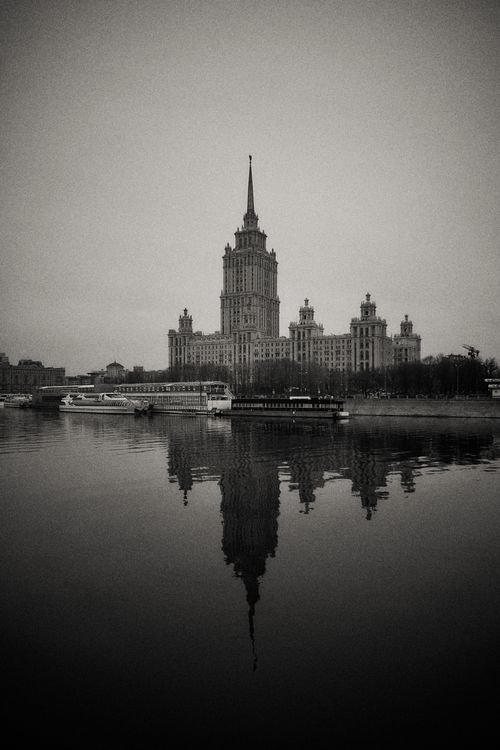 Free Dramatic black and white reflection of Radisson Collection Hotel in Moscow's waters. Stock Photo