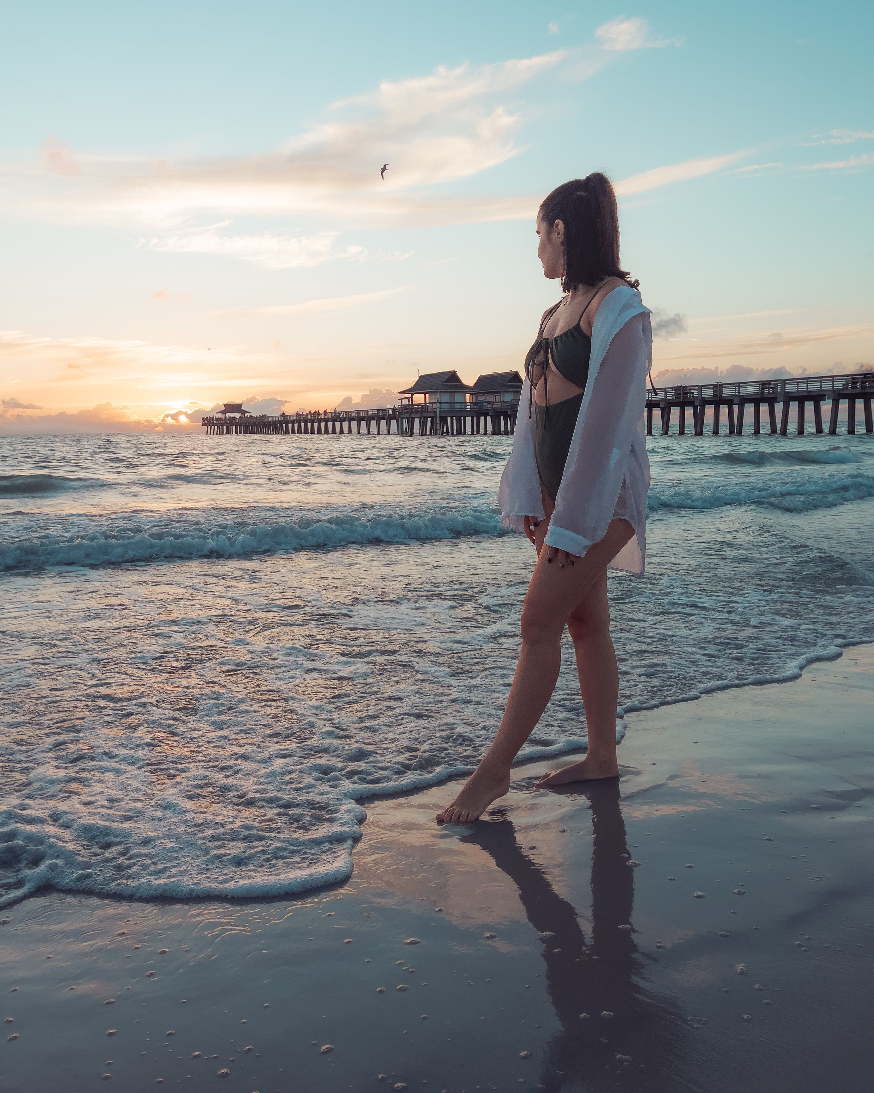 Model in Pleated Bikini on the Beach at Sunset · Free Stock Photo