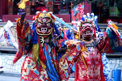 People in Customes Dancing on a Street