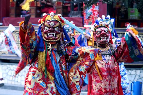 Free Colorful dancers in traditional costume at a Kathmandu festival. Stock Photo
