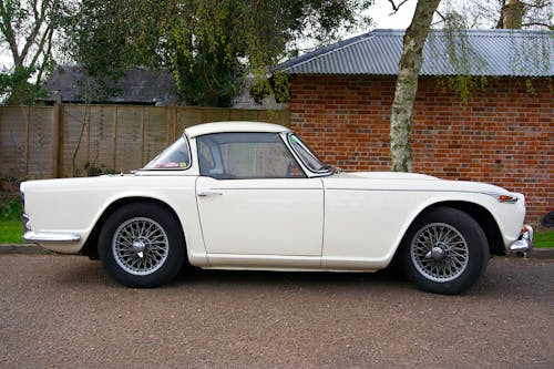 A Classic White Car on the Road