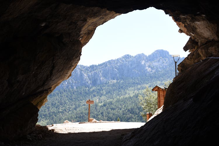 View Of Green Mountains From A Cave Opening