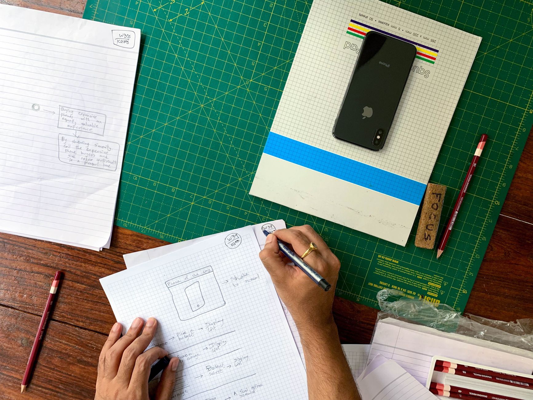 Designer sketching a digital experience