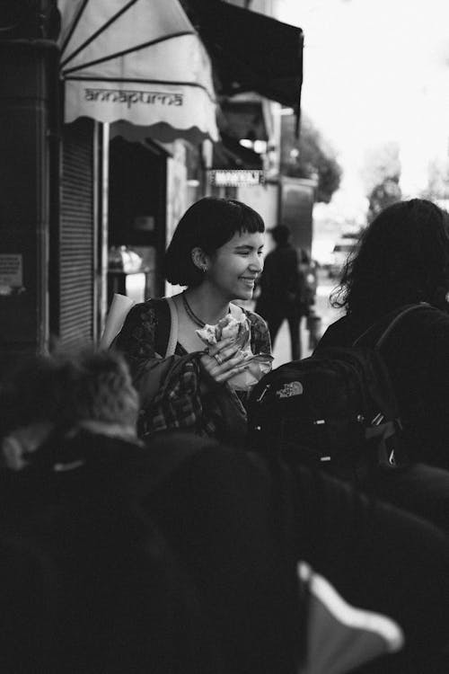 Smiling Woman among People