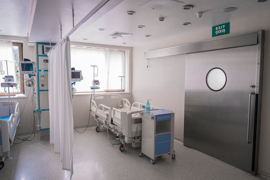 Spacious hospital room in Baku featuring medical beds and equipment.