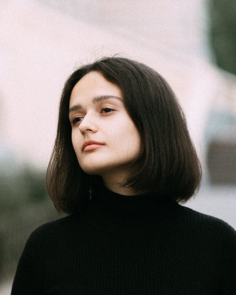 Portrait Of Woman In Black Turtleneck