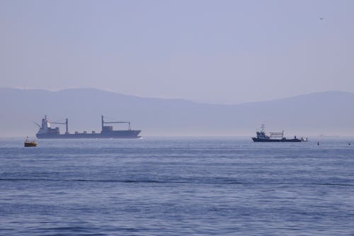 Kostenloses Stock Foto zu berg, boote, meer