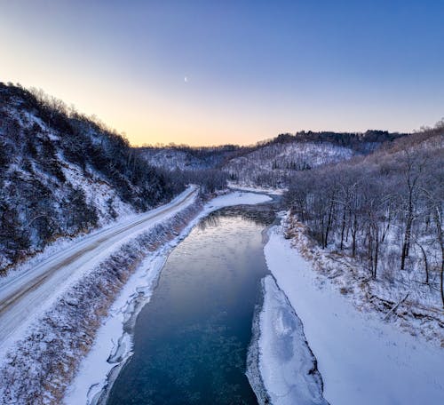 Free Drone Shot of an Icy River During Winter Stock Photo