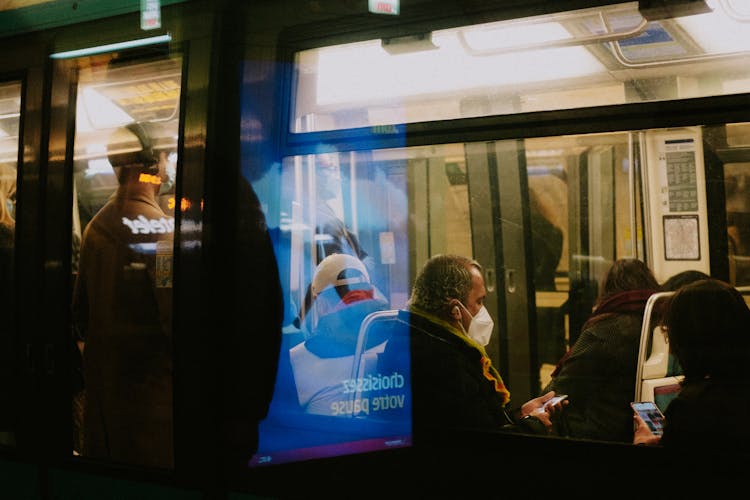 Busy People Riding In A Train