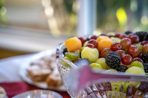 Bowl with Fruits on Table