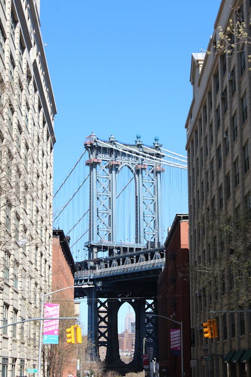 Бесплатное стоковое фото с вертикальный выстрел, манхэттенский мост, небо