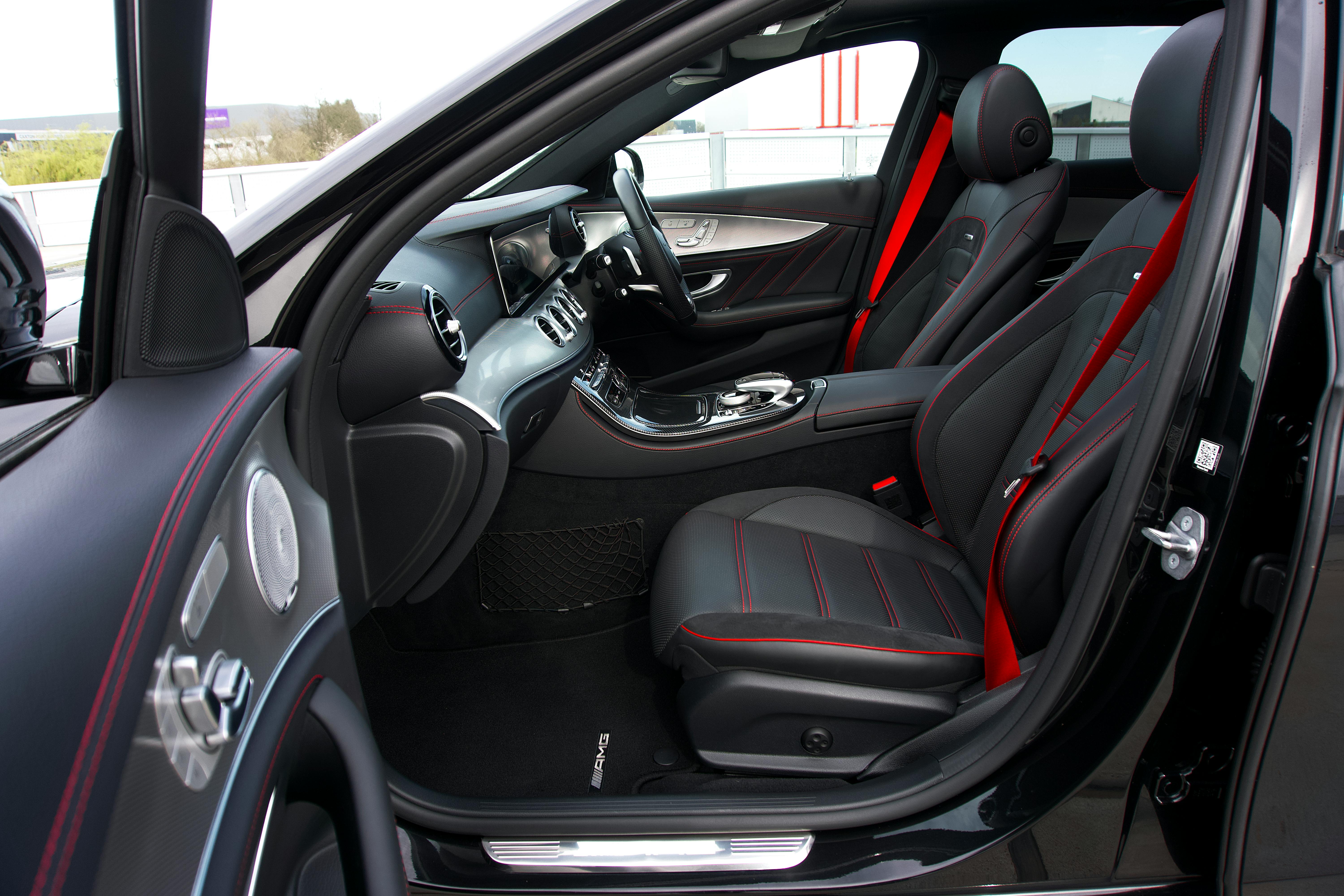 Black and Red Interior of a Car · Free Stock Photo