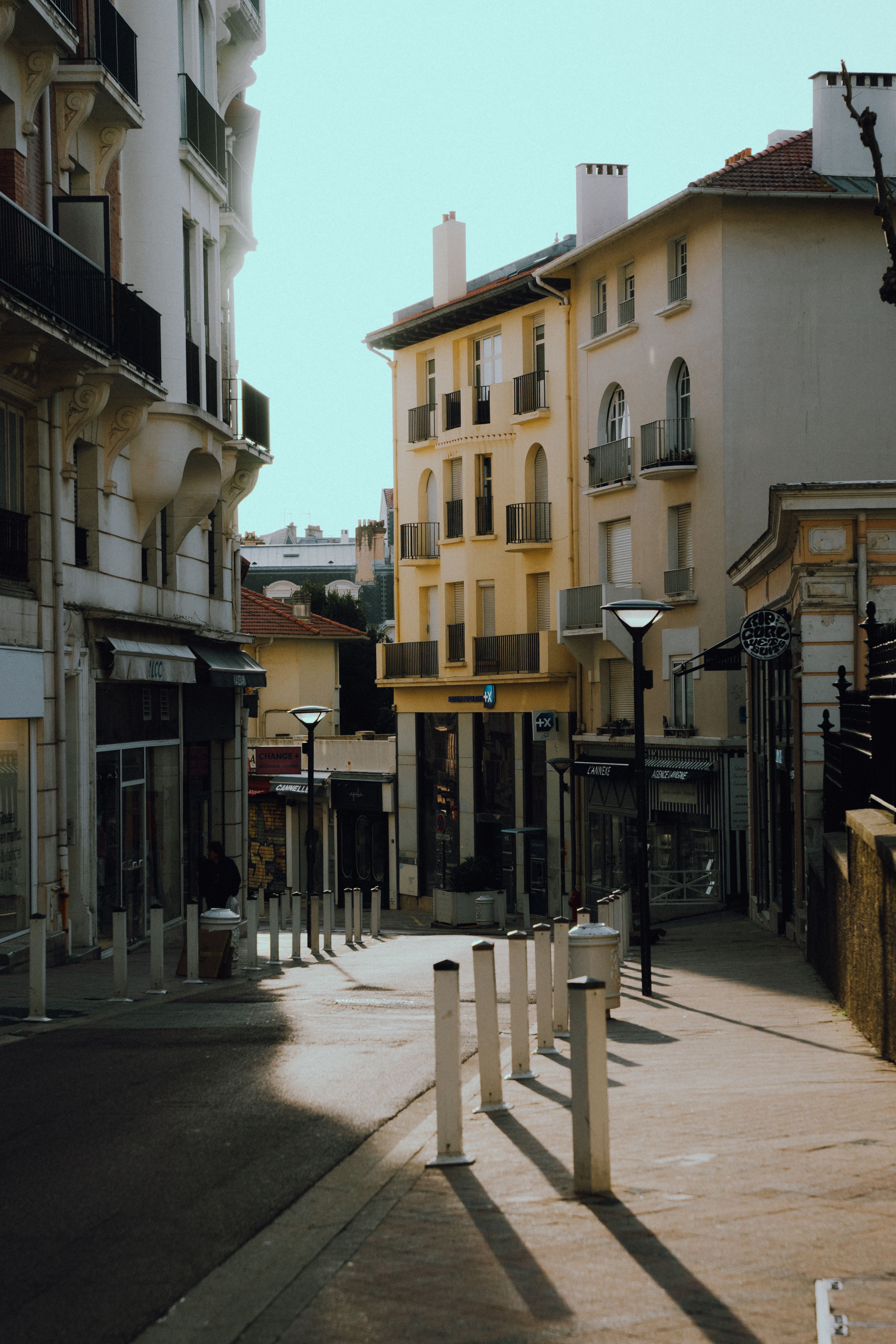 Beautiful sunlit street in Biarritz, France with historic architecture and quiet ambiance.