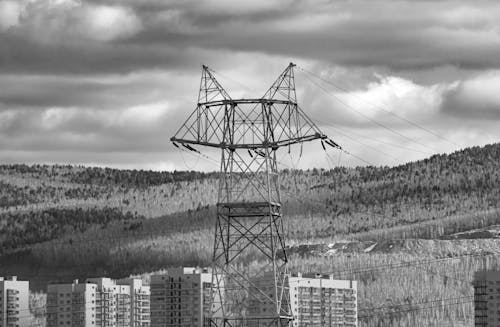Black and White Shot of a Transmission Tower