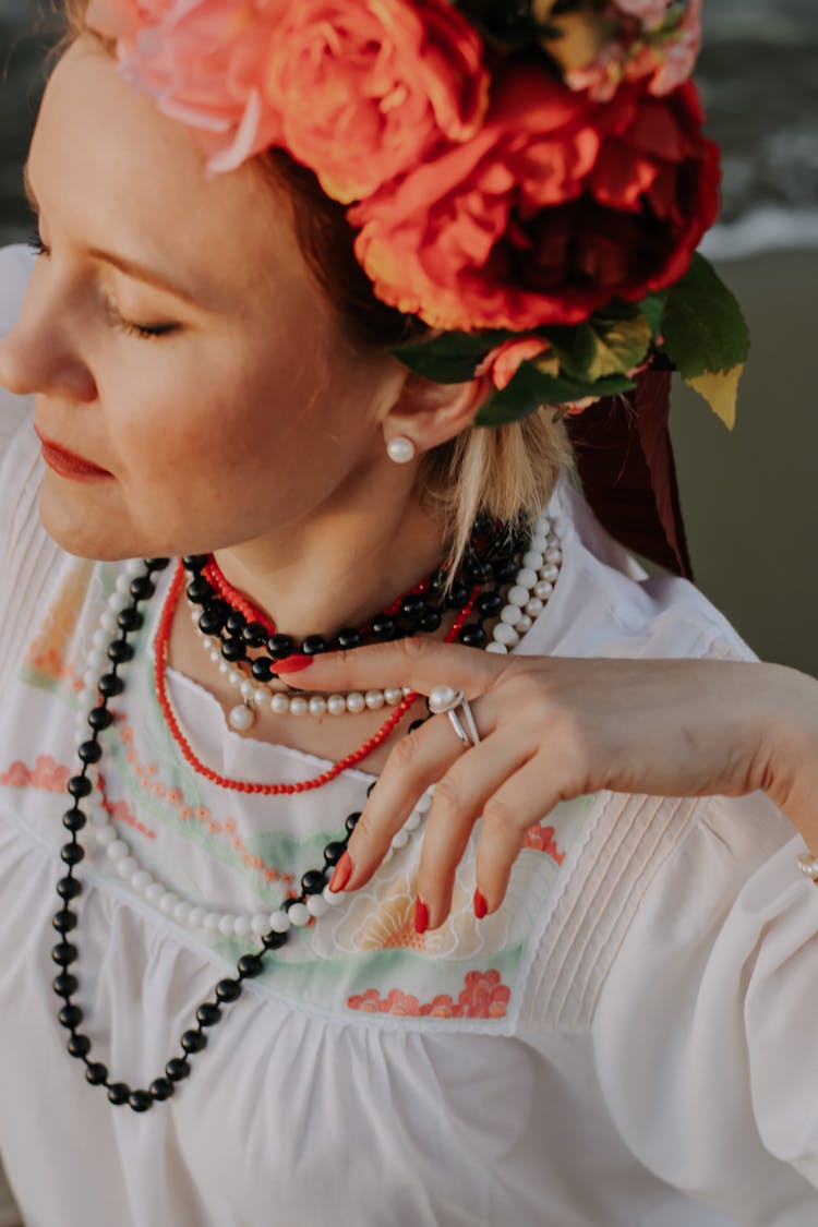 Closeup Of A Woman Wearing Traditional Dress And Pink Flower Wreath