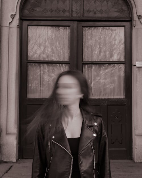 Blurred Shot of a Woman Wearing Leather Jacket