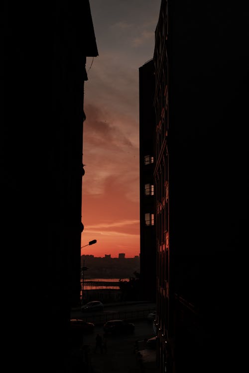 Silhouettes of Buildings During Sunset