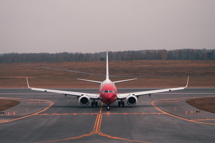 Front View Of An Airplane On The Runway