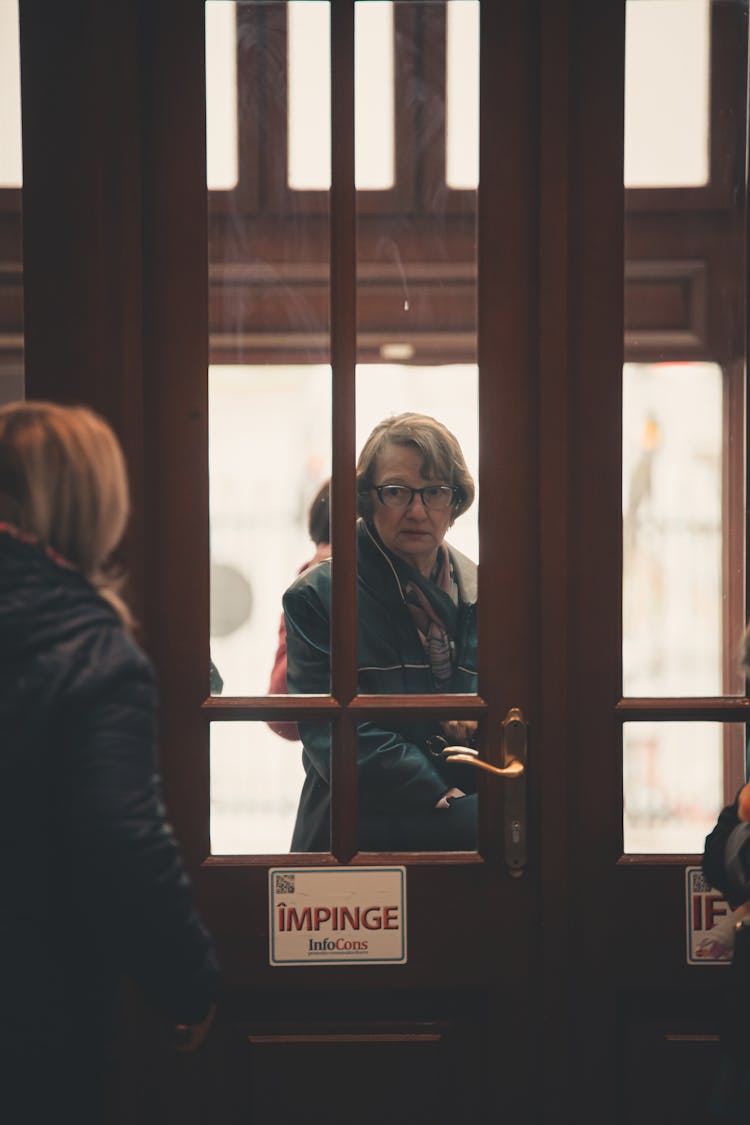 Woman Entering Through Door