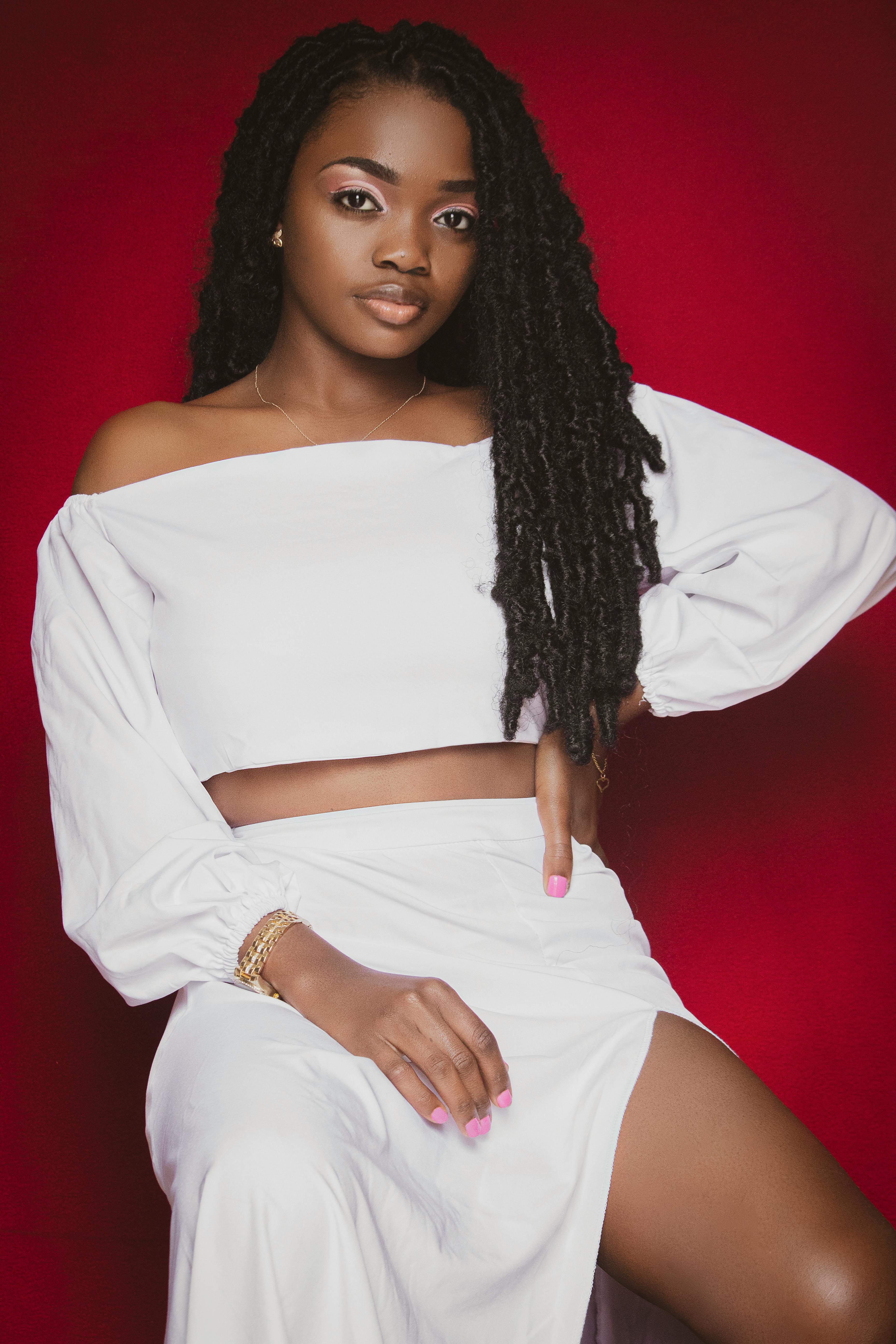 Healthcare workers in protective suits discussing test results on a tablet