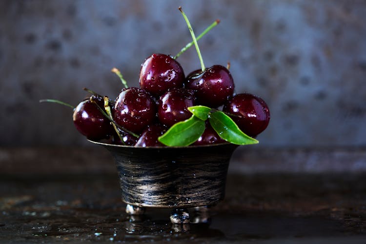 Red Cherries On Stainless Steel Bowl