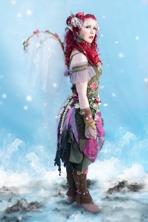Photo of a Woman with Red Hair Wearing a Costume