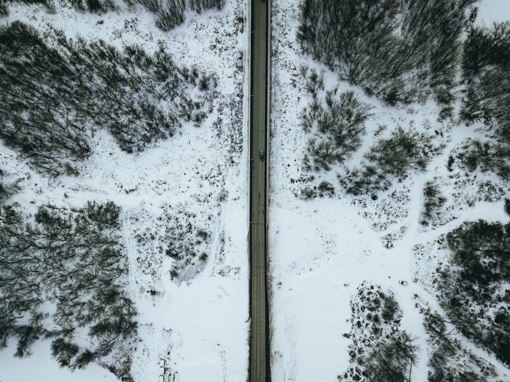 Aerial Photo of Gray Concrete Road during Winter