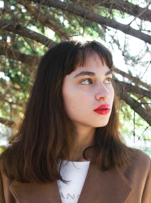 Portrait of a Woman Red Lips Looking Away