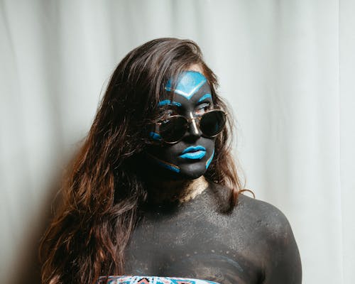 Free Woman in Black Sunglasses and Body Paint  Stock Photo