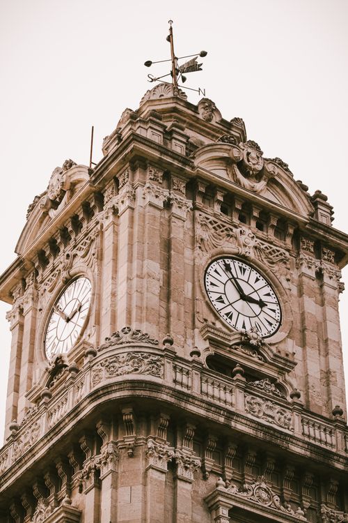 Free The ornate Dolmabahçe Clock Tower in İstanbul, Türkiye, showcasing classic architecture. Stock Photo