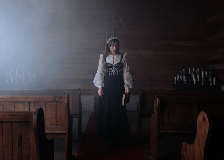 Woman Walking On Church Aisle 