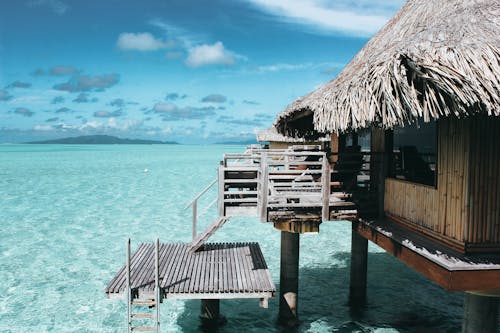 Free Brown Nipa Hut on Body of Water Stock Photo