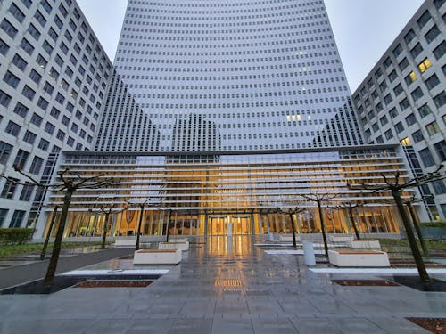 Gray Concrete Building with Glass Panels 