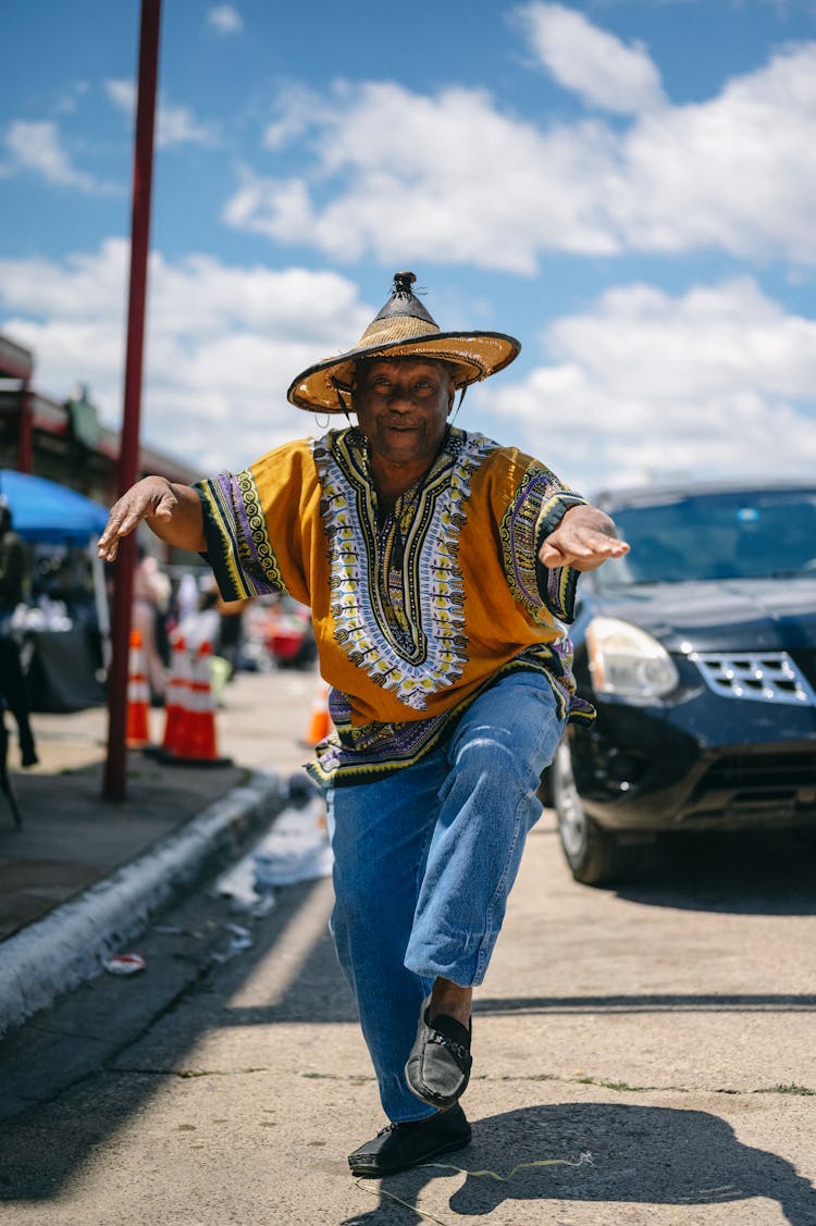 A Man Dancing On The Street